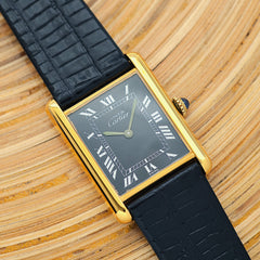 The Cartier Must Tank, appealing due to its rarity as a hand-wound model.