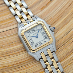 The definitive women's watch is the Cartier Panthère 2rangs.