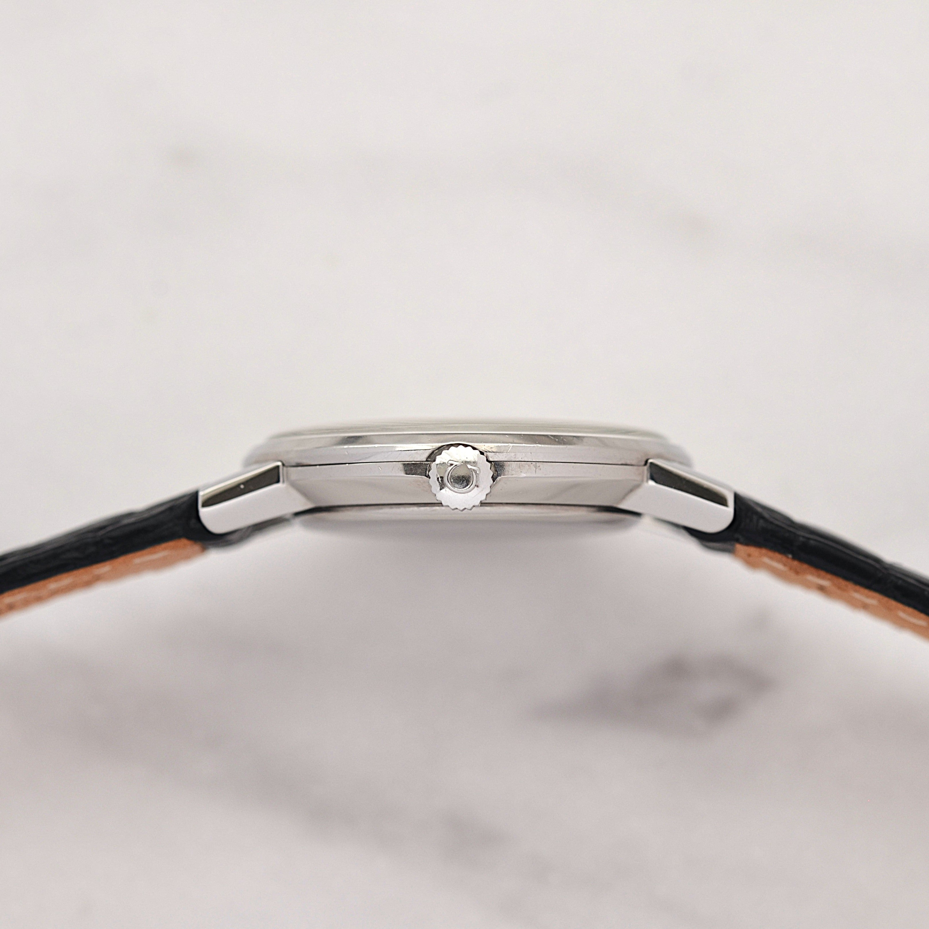 【OMEGA】Omega Genève SS Round White Roman with original buckle