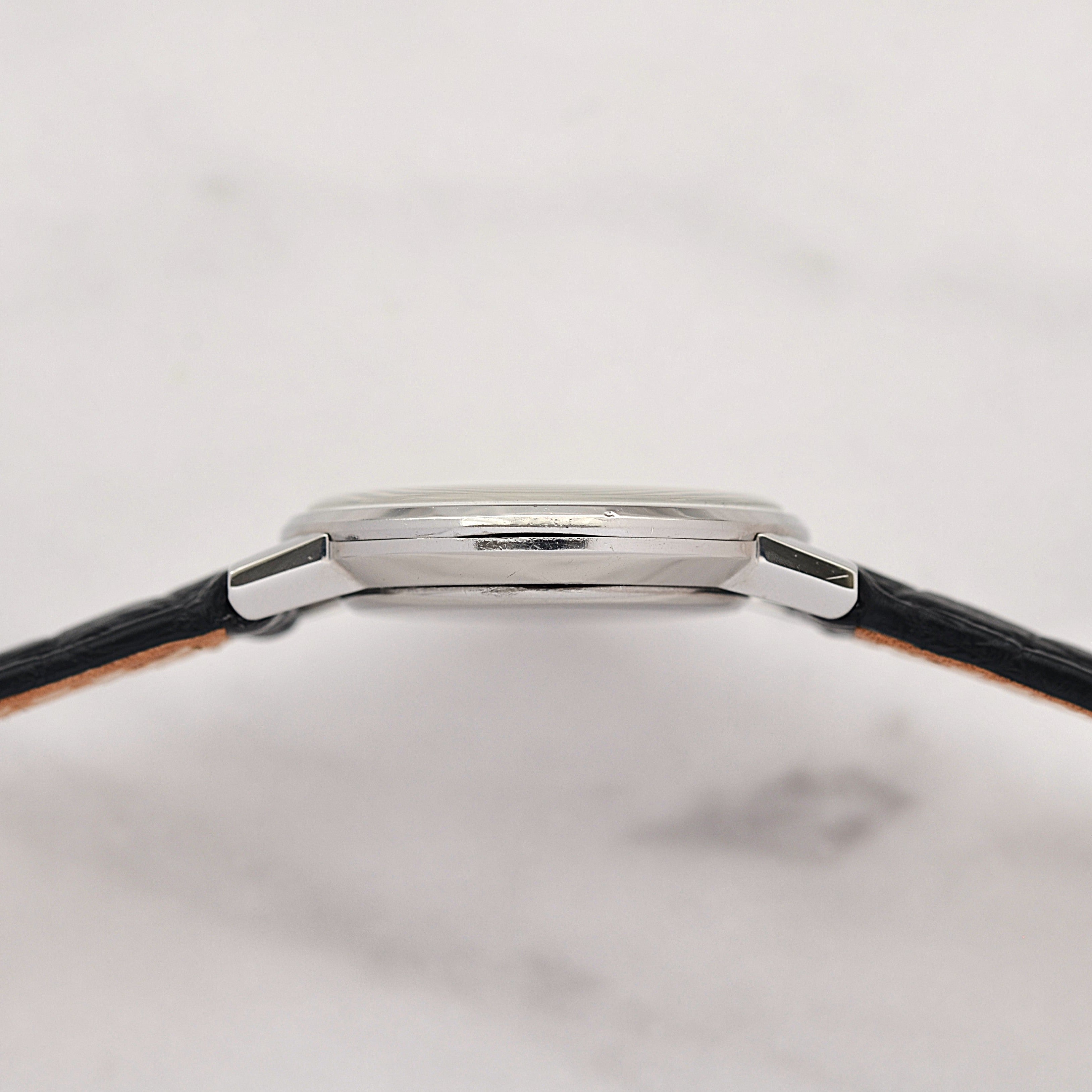 【OMEGA】Omega Genève SS Round White Roman with original buckle