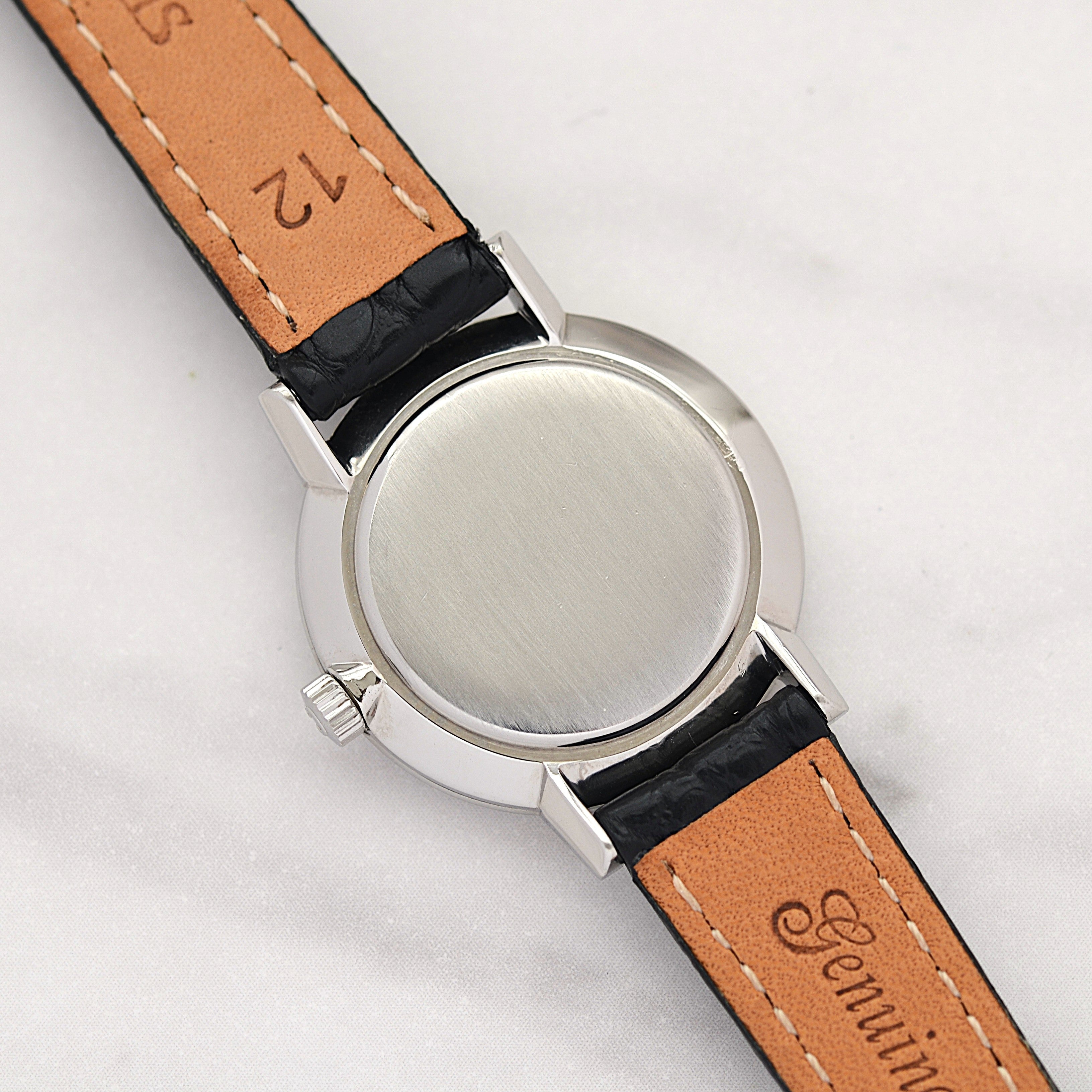 【OMEGA】Omega Genève SS Round White Roman with original buckle