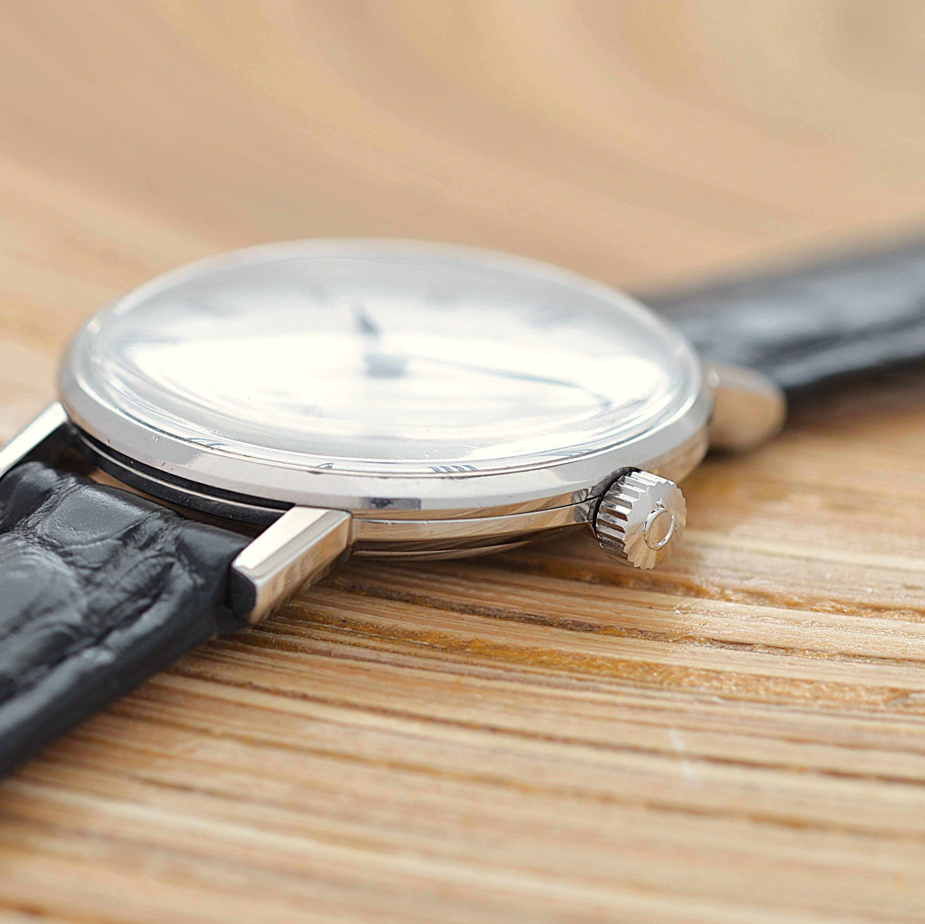 【OMEGA】Omega Genève SS Round White Roman with original buckle