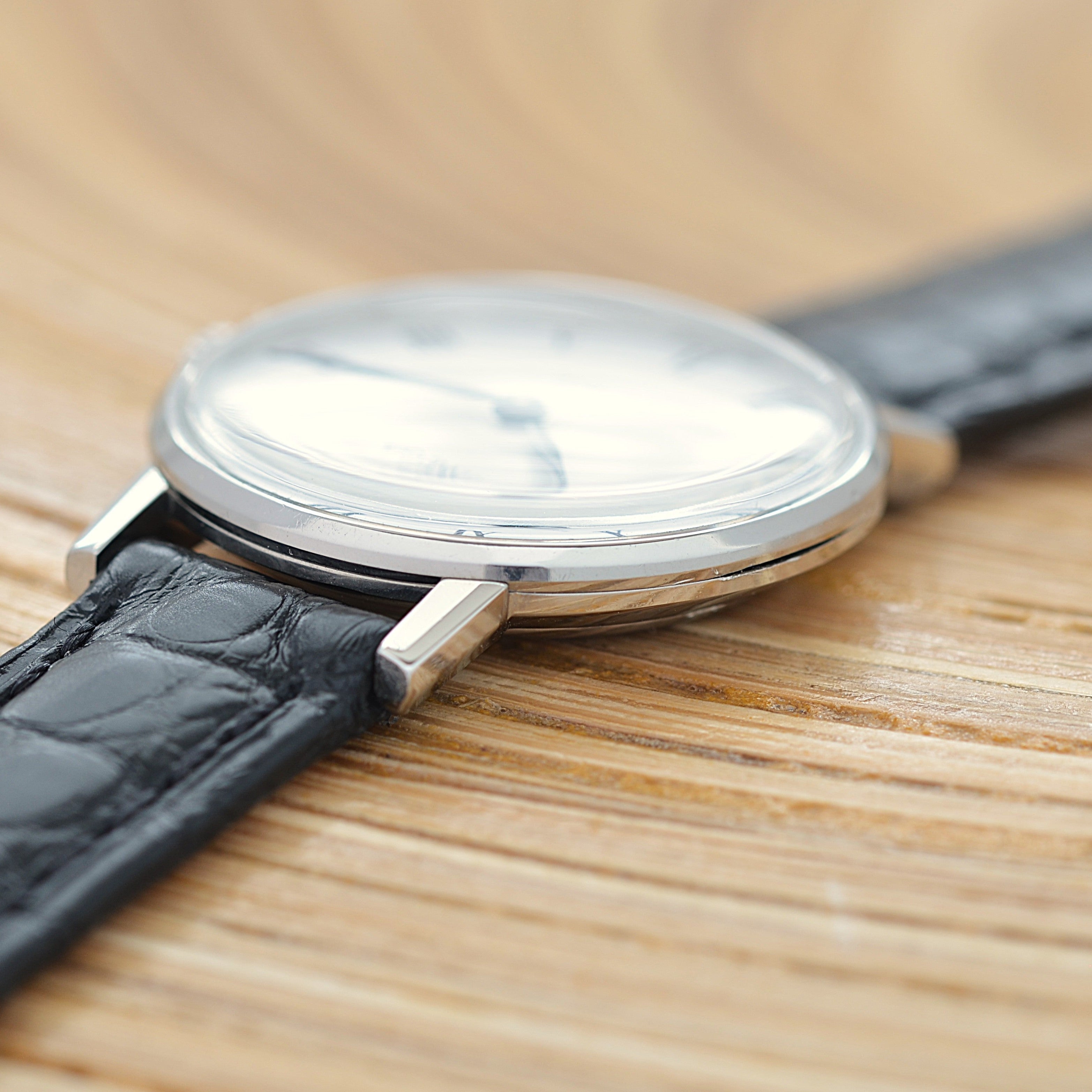 【OMEGA】Omega Genève SS Round White Roman with original buckle
