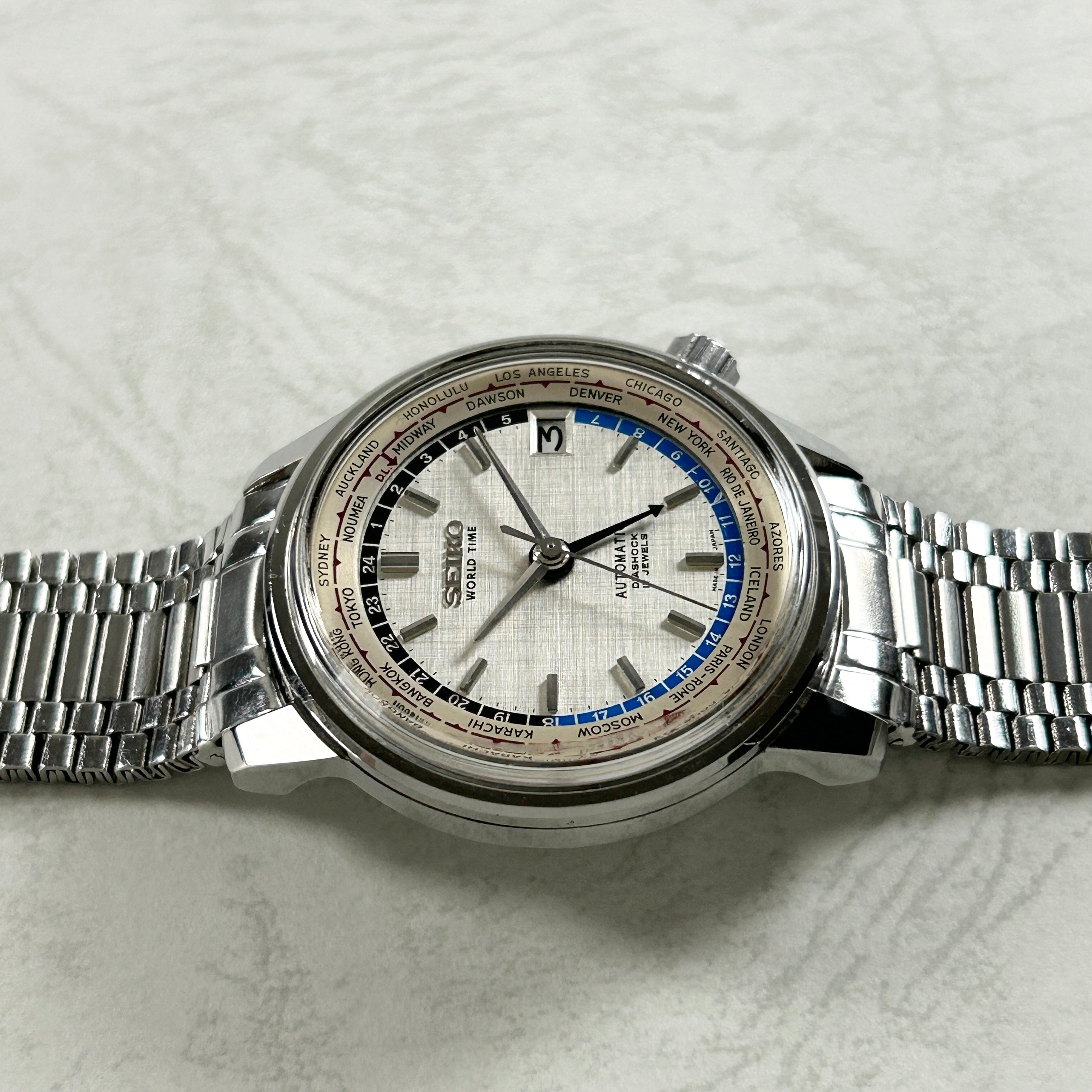 【SEIKO】セイコー<BR>ワールドタイム1st 6217-7000 東京五輪Silver <BR>純正ブレスレット付き